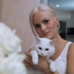 why does my cat knead me but not my husband